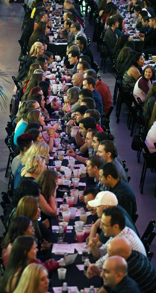 About 1,000 hopefuls take the opportunity to meet while enjoying $1 drink specials, giveaways and more while breaking the world record for the largest speed-dating event at the D Date-a-thon on Friday, Feb. 14, 2014.  L.E. Baskow